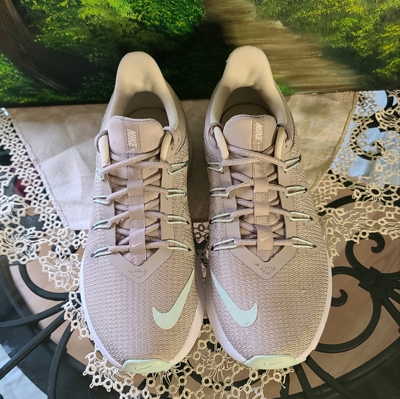 Nike running shoe gray and mint green in color - Picture 3 of 11